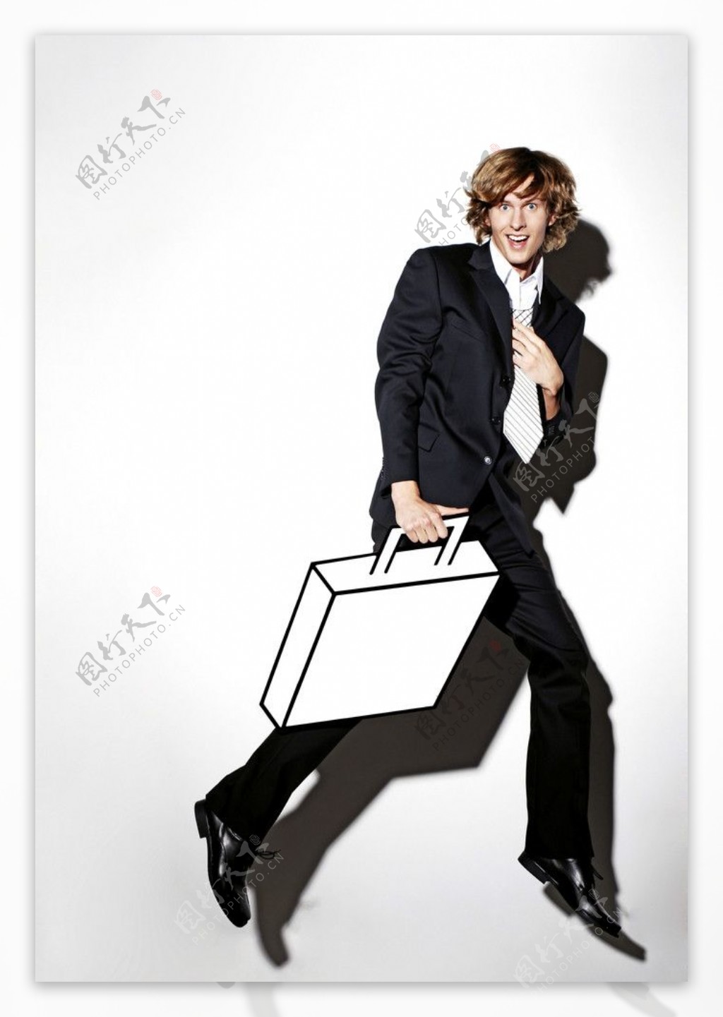 提着模型公文包跑步的商务人物图片