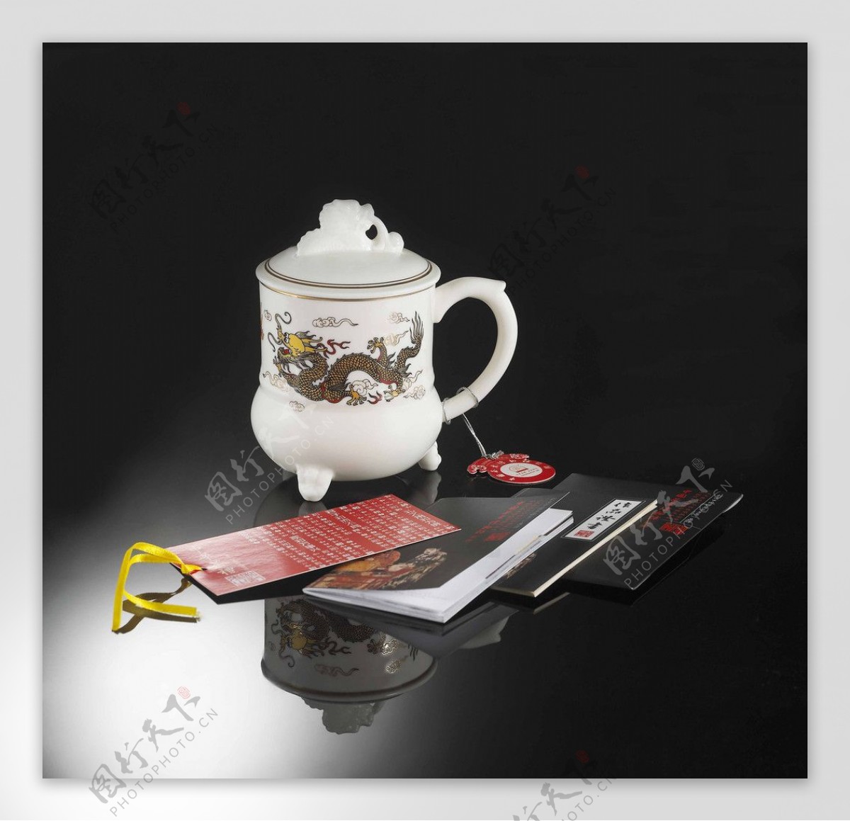 白玉瓷双龙茶杯图片